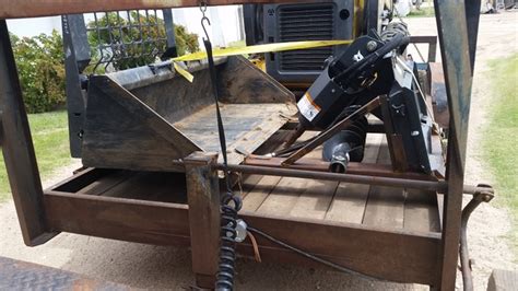 skid steer trailer racking|skid steer attachment rack.